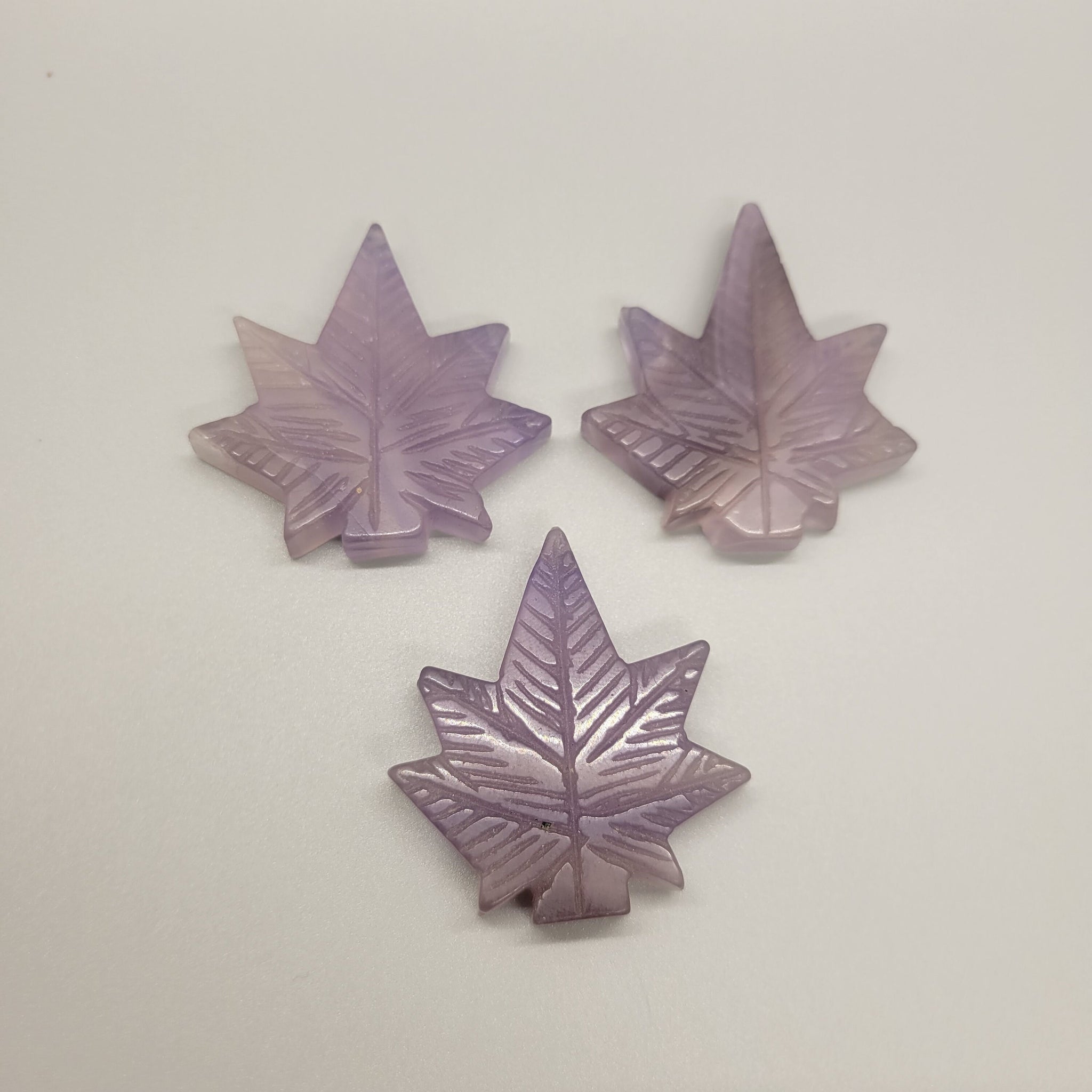 Purple Fluorite Cannabis Leaf Carved Stone